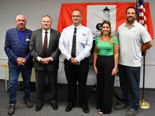 The five members of East Islip's Board of Education. Photo: Greg Fasolino