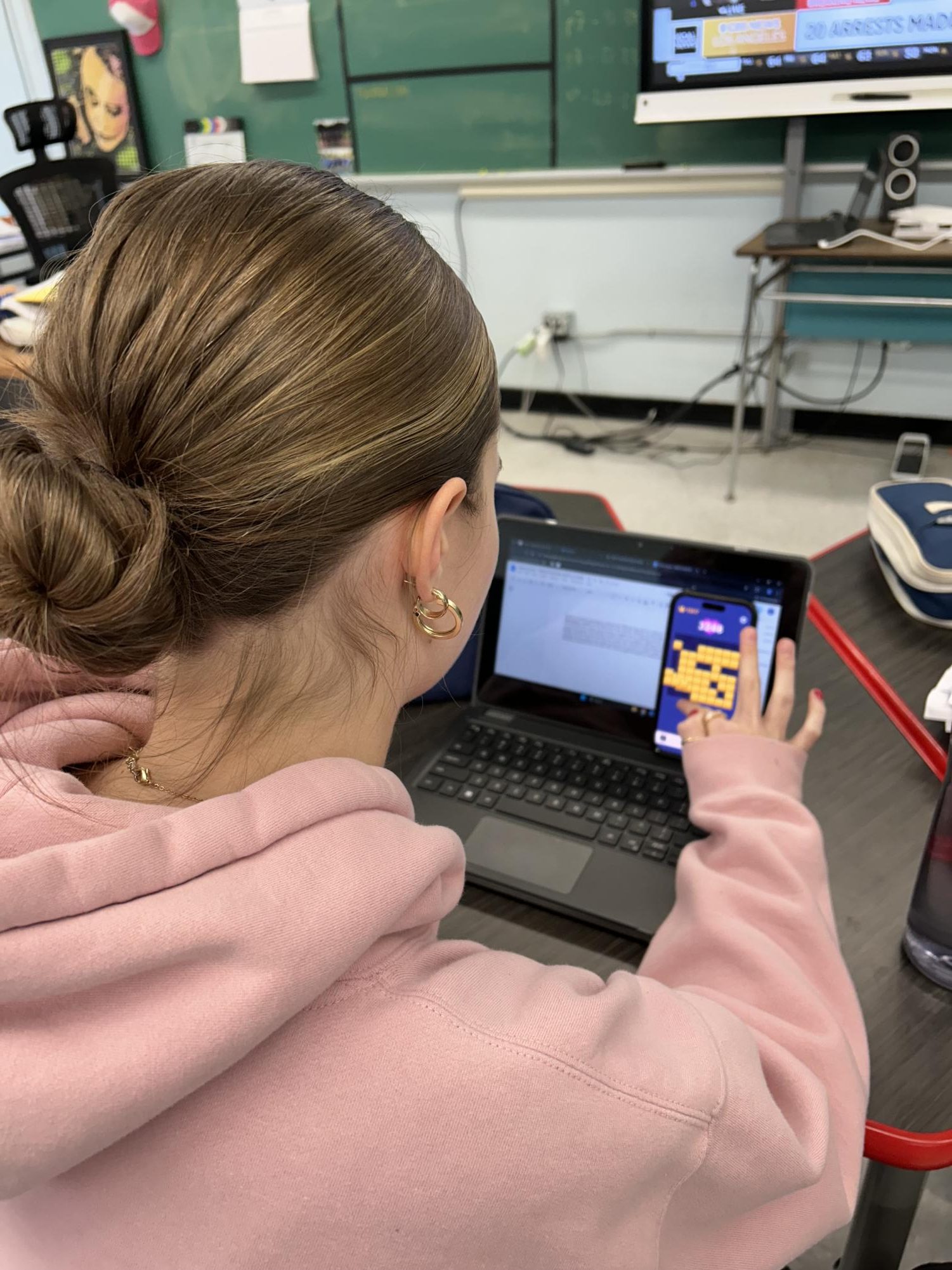 Students play Block Blast anywhere they can - even in class.