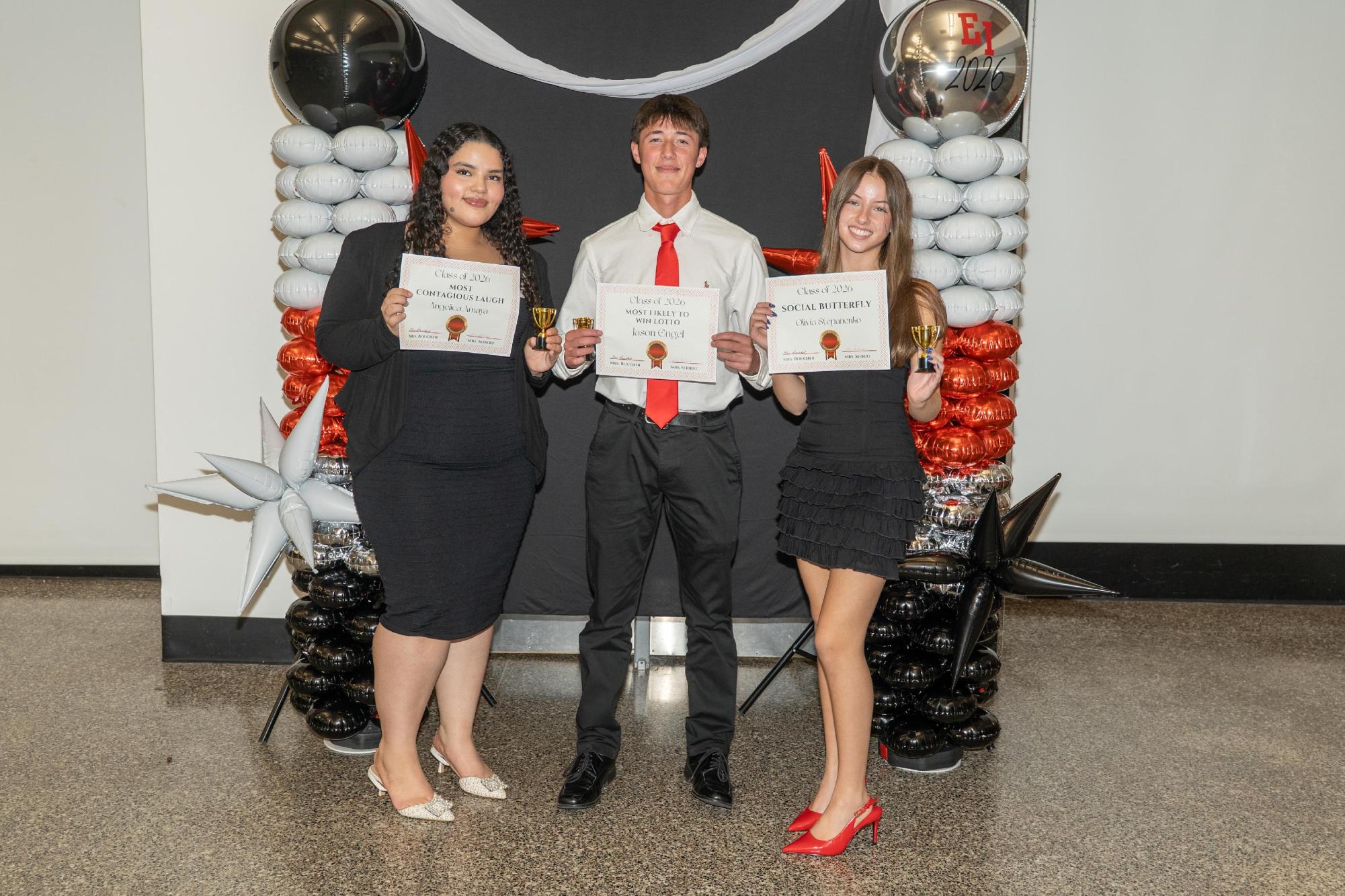 Seniors with their 2026 Superlative certificates.