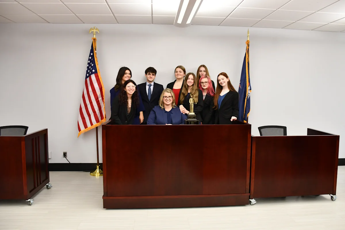Members of the team in their new courtroom.