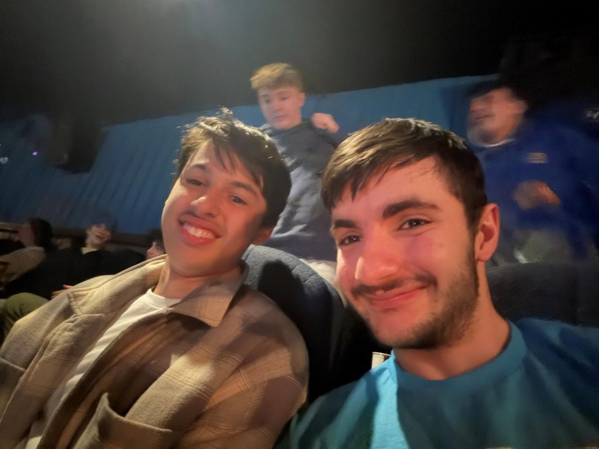 My friend and I at the movie theater, seeing the new Mario movie.